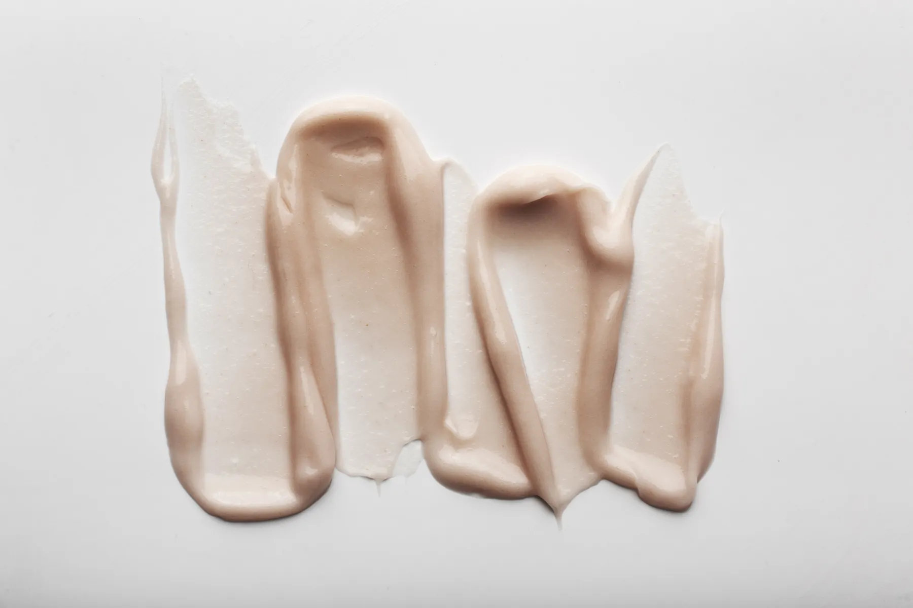 Strokes of pale pink cream