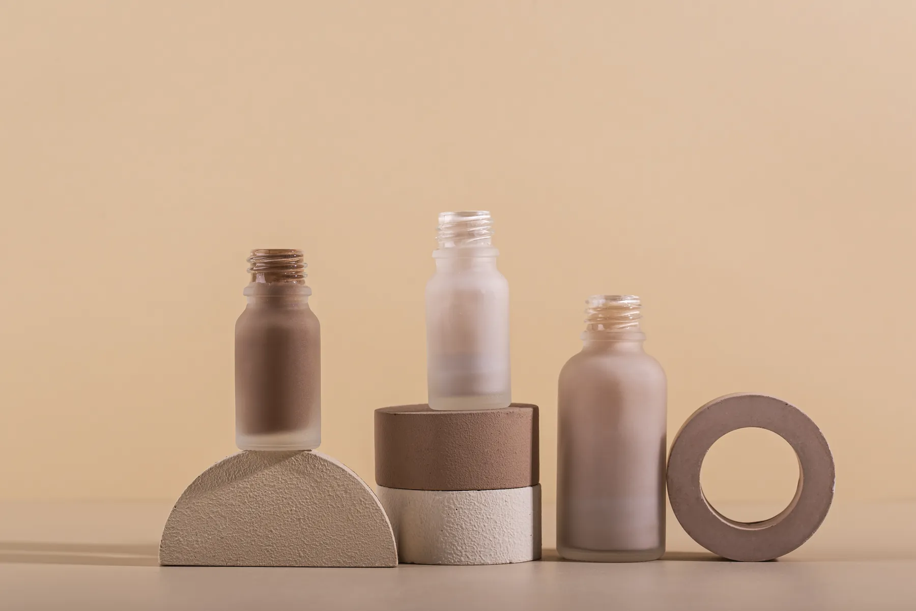 Rows of unlabelled cosmetic packaging